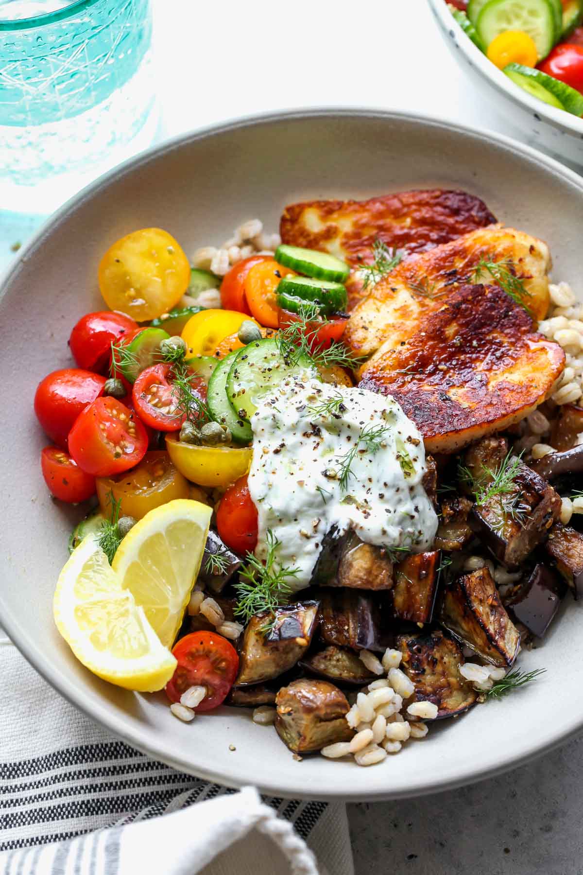 Mediterranean Eggplant and Halloumi Bowls with Lemon-Dill Sauce